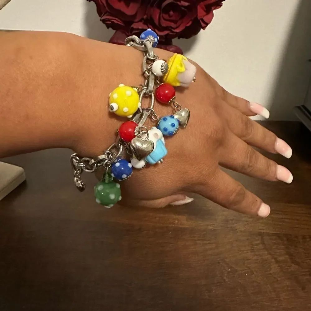 Gorgeous multicolored charm glass bracelet , with cupcakes, and mushrooms beads